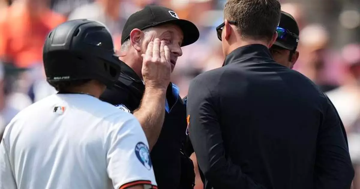 Plate umpire Chris Guccione leaves Orioles-Guardians game after being hit in the mask by a foul tip