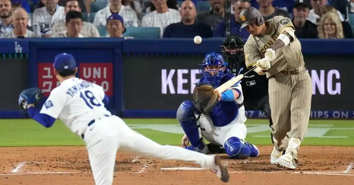 Machado powers the Padres past the Dodgers 5-1, snapping Los Angeles' 11-game home winning streak