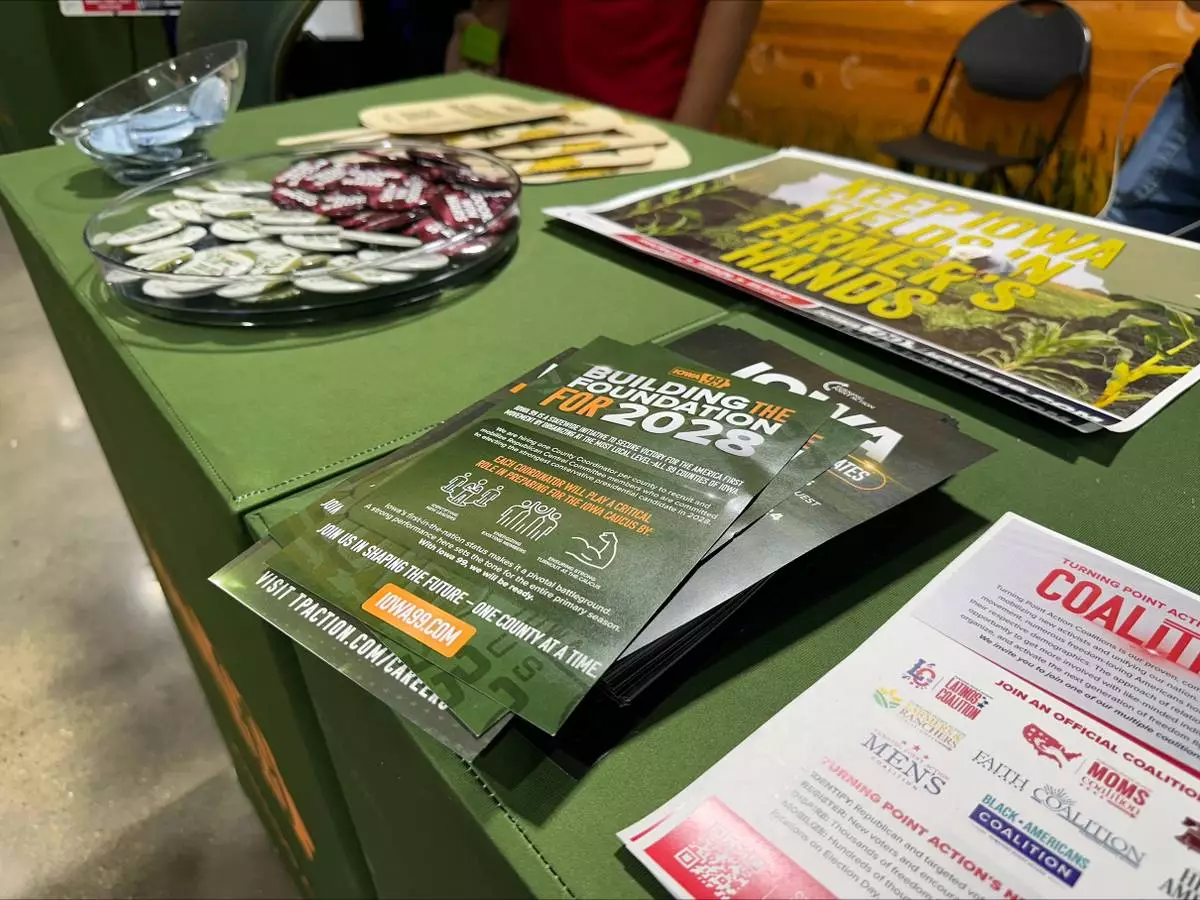 Turning Point Action outlines their goals for the 2028 presidential cycle at the Iowa State Fair in Des Moines, Iowa, Friday, Aug. 21, 2026. (AP Photo/Hannah Fingerhut)
