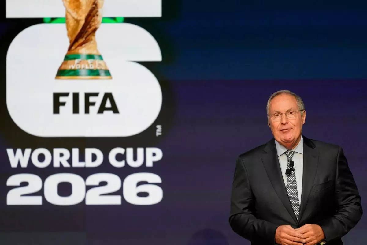 FILE - Host Andrés Cantor speaks during the match schedule reveal for the 2026 soccer World Cup in Washington, Saturday, Dec. 6, 2025. (AP Photo/Chris Carlson,File)