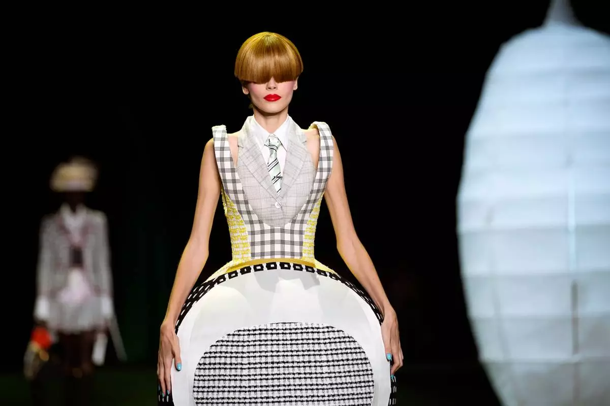 A model walks the runway during the Thom Browne Spring/Summer 2027 presentation as part of New York Fashion Week on Tuesday, Sept. 15, 2026, in New York. (Photo by Charles Sykes/Invision/AP)