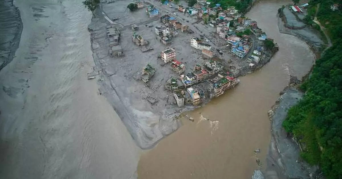 2 trapped workers rescued from a hydropower tunnel 9 days after Nepal floods