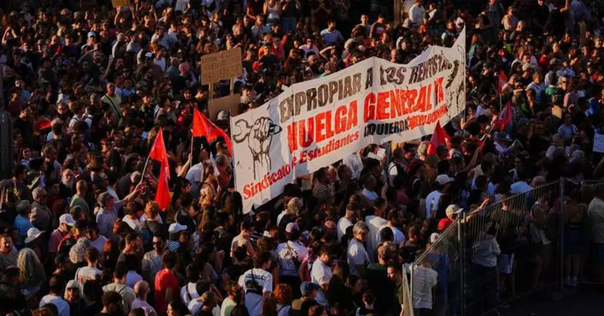 Thousands march in Madrid to protest Spain's housing crisis after eviction of 87-year-old woman
