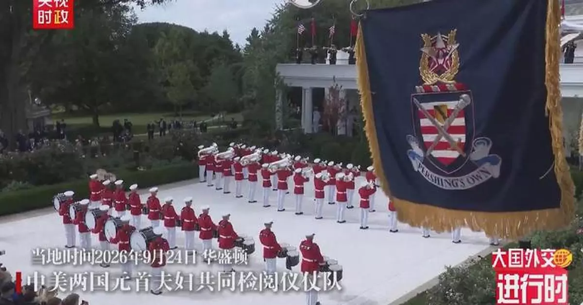 Xi, Trump attend military review at Rose Garden