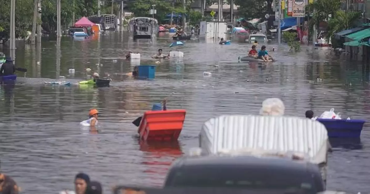 Bangkok suburbs endure daily struggle as floodwaters linger