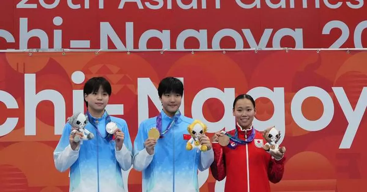 Chinese 13-year-old Yu Zidi starts quickly in the pool at the Asian Games