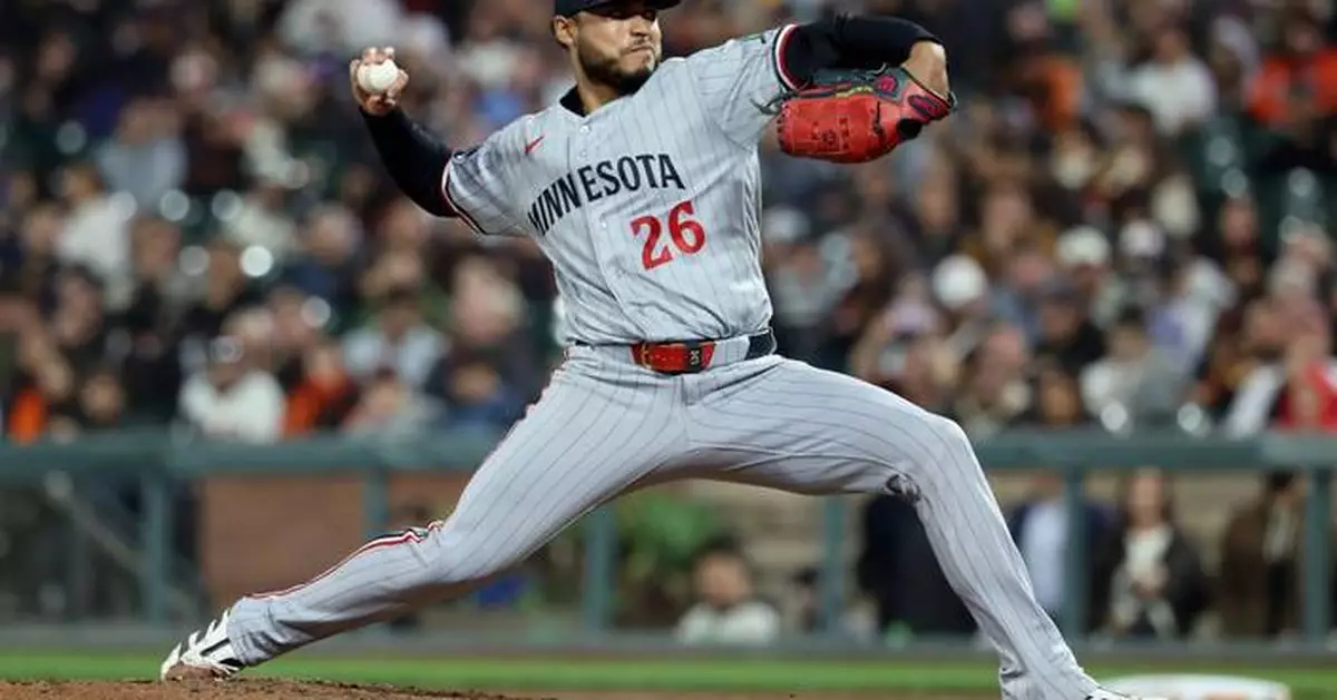 Bradley passes 200 strikeouts, pitches Twins to 3-2 win over Giants