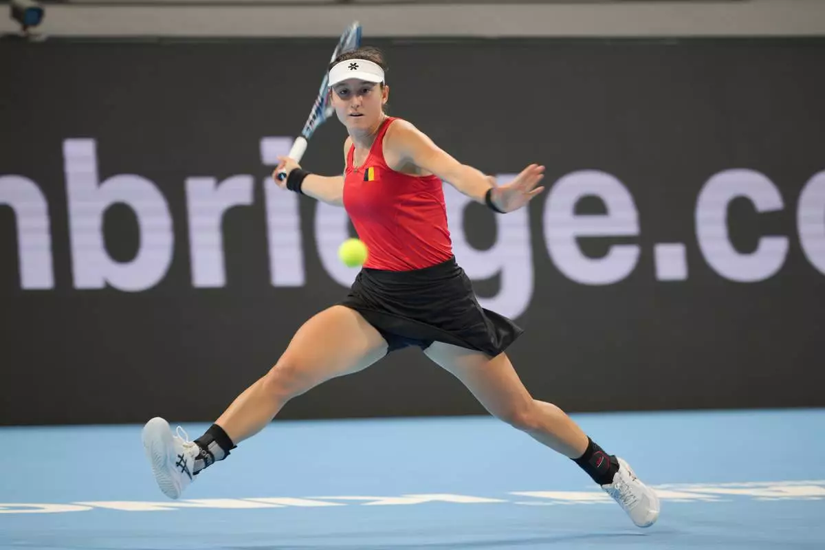 Belgium's Jana Otzipka, returns a ball to Ukraine's Anhelina Kalinina during the Billie Jean King Cup quarterfinals tennis match in Shenzhen, China's Guangdong province, Thursday, Sept. 24, 2026. (AP Photo/Andy Wong)