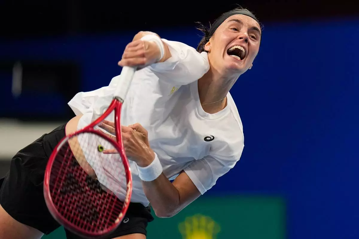 Ukraine's Anhelina Kalinina, returns a ball to Belgium's Jana Otzipka during the Billie Jean King Cup quarterfinals tennis match in Shenzhen, China's Guangdong province, Thursday, Sept. 24, 2026. (AP Photo/Andy Wong)
