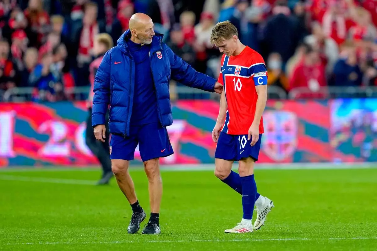 Norway's Martin Ødegaard reacts at the end of a Nations League soccer match between Norway and Portugal, in Oslo, Sunday, Sept. 27, 2026. (Lisa Aserud/NTB Scanpix via AP)