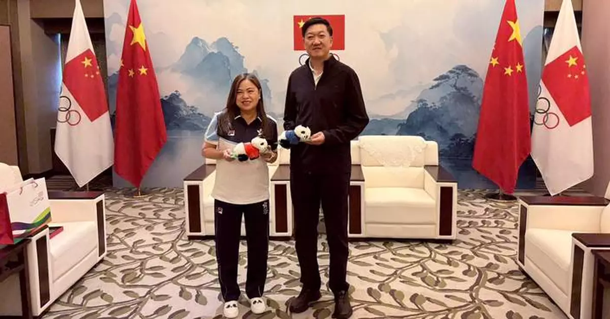 Hong Kong Athletes Shine with Four Medals at 20th Asian Games, Including Silver in Karate and Bronze in Swimming.