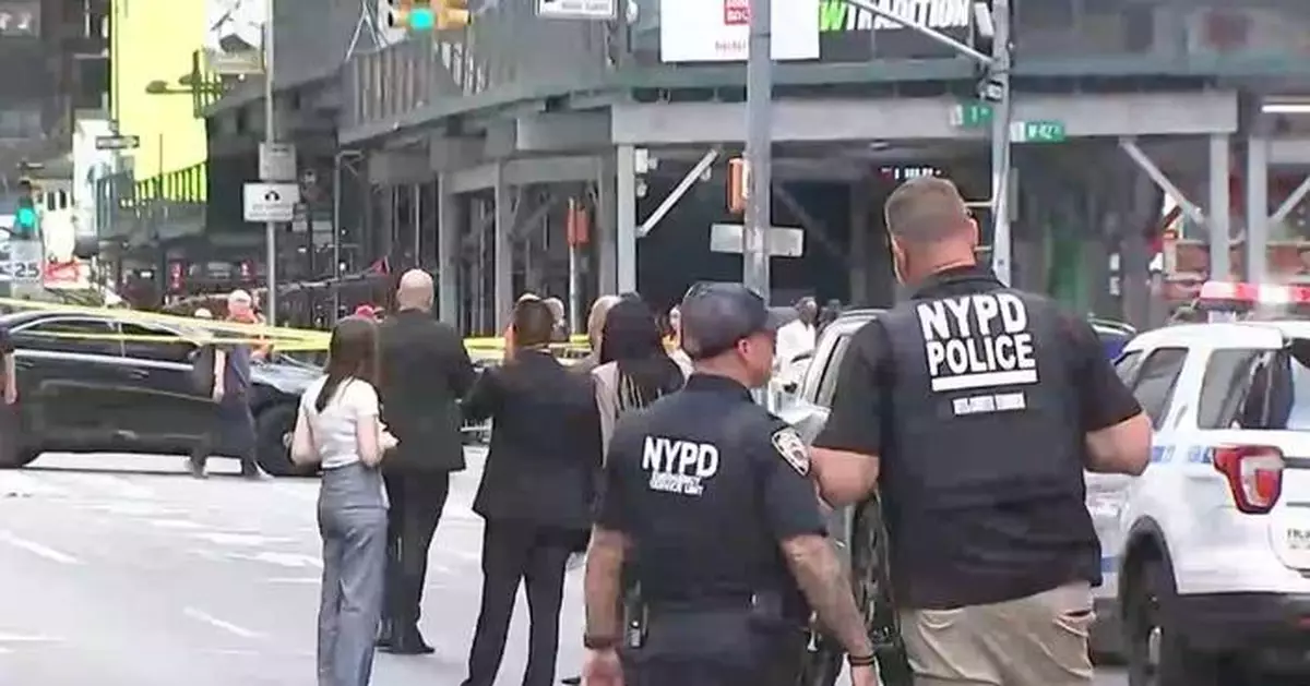 Woman randomly stabs 2 people in New York City's Times Square, killing 1, then is killed by police