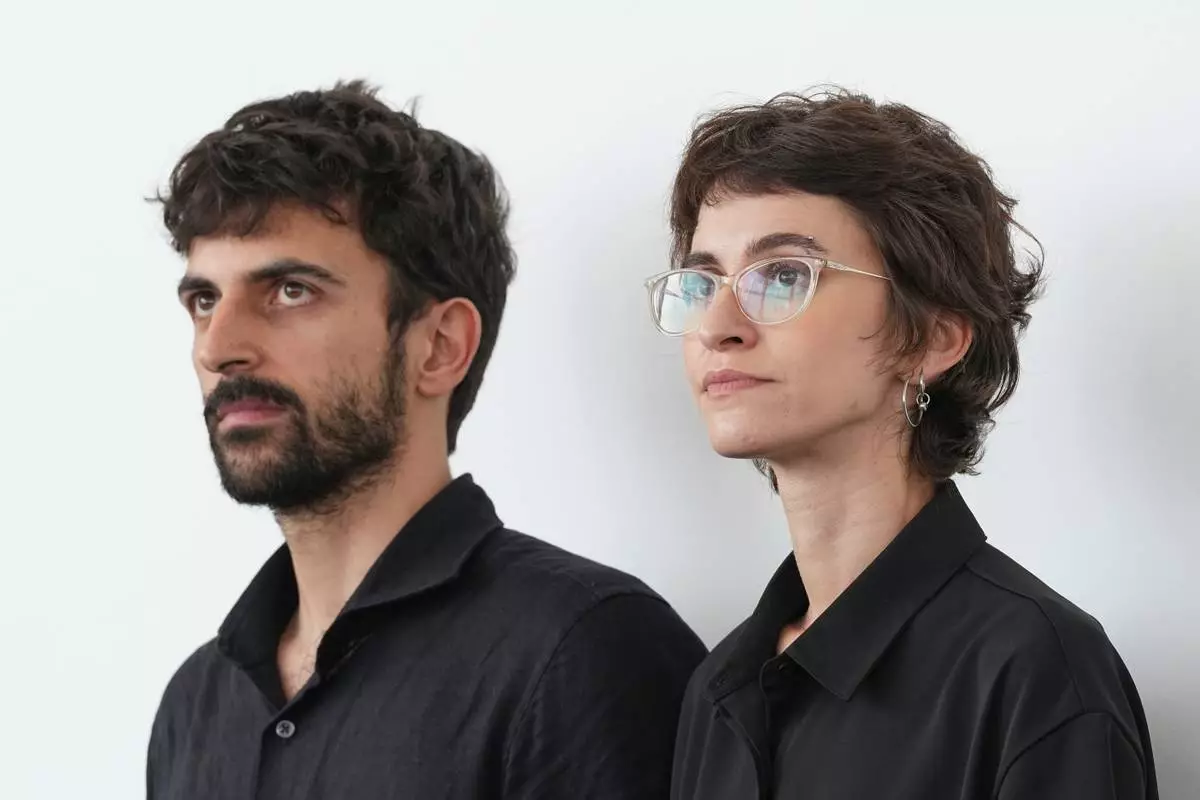 Directors Yuval Abraham, left, and Rachel Szor pose for photographers at the photo call for the film 'Naza' during the 83rd edition of the Venice Film Festival in Venice, Italy, on Thursday, Sept. 10, 2026. (Photo by Scott A Garfitt/Invision/AP)