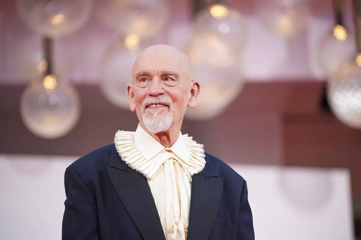 John Malkovich poses for photographers at the red carpet for the film 'Wild Horse Nine' during the 83rd edition of the Venice Film Festival in Venice, Italy, on Thursday, Sept. 3, 2026. (Photo by Alessandra Tarantino/Invision/AP)