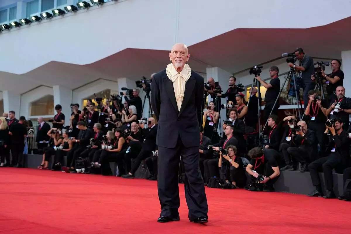 John Malkovich poses for photographers at the red carpet for the film 'Wild Horse Nine' during the 83rd edition of the Venice Film Festival in Venice, Italy, on Thursday, Sept. 3, 2026. (Photo by Alessandra Tarantino/Invision/AP)