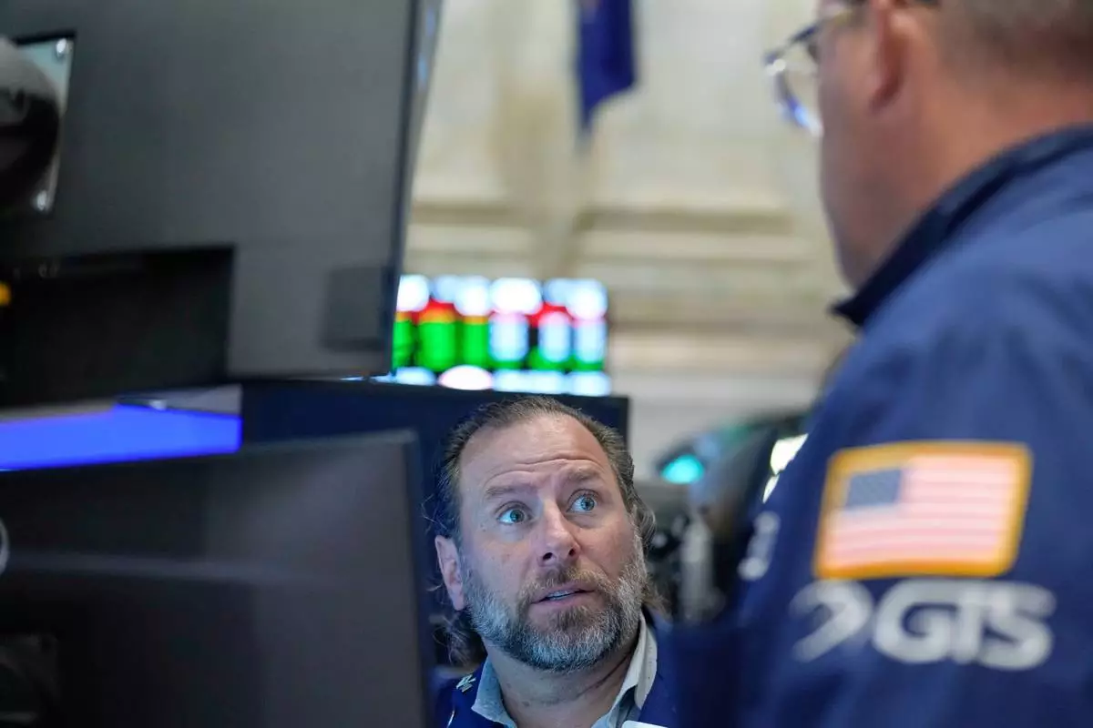 Michael Pistillo works on the floor at the New York Stock Exchange in New York, Monday, Sept. 14, 2026. (AP Photo/Seth Wenig)