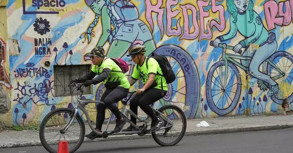 Tandem bicycle club in Ecuador's capital leads blind riders to new adventures
