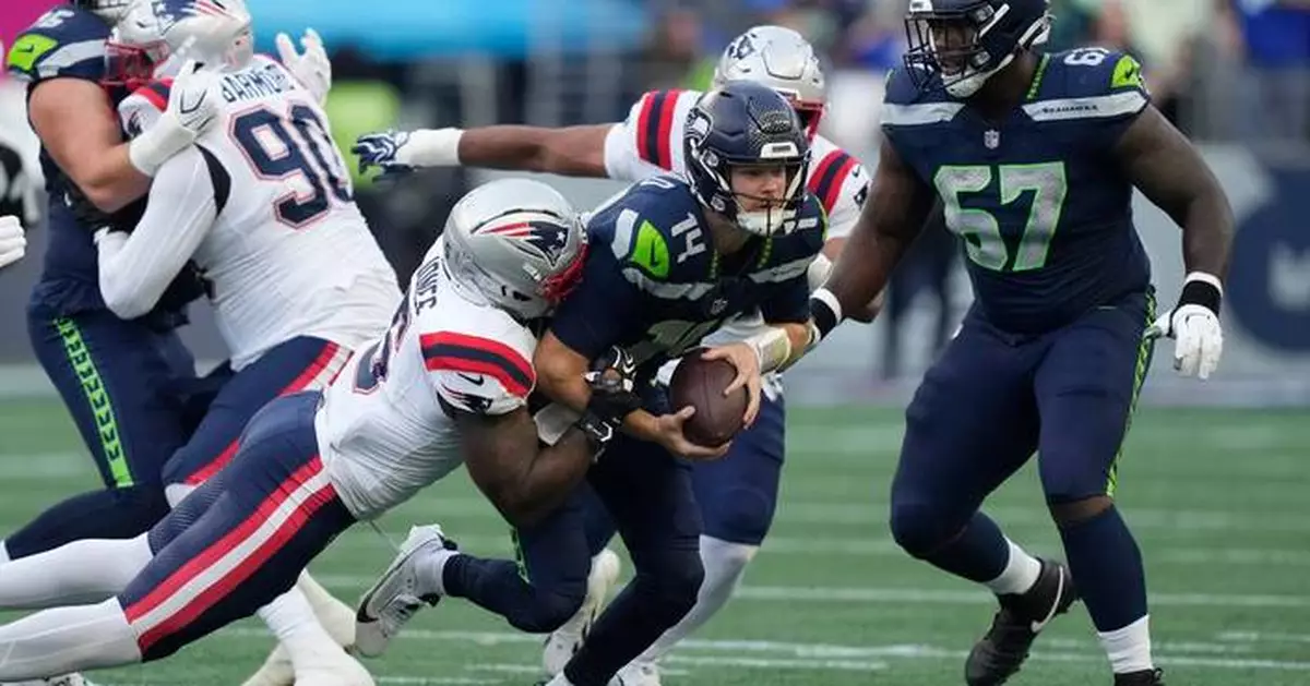 Photos of the NFL season opener, a rare Super Bowl rematch between the Seahawks and Patriots
