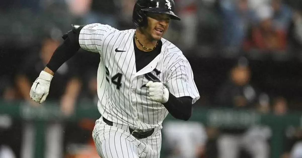 White Sox keep pace in the AL Central with a rain-soaked 8-1 win over the Tigers
