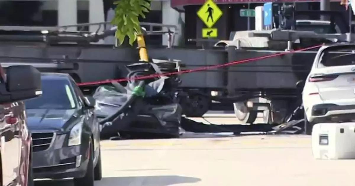 Officials say 4 people were hospitalized after a crane collapsed at a Miami construction site