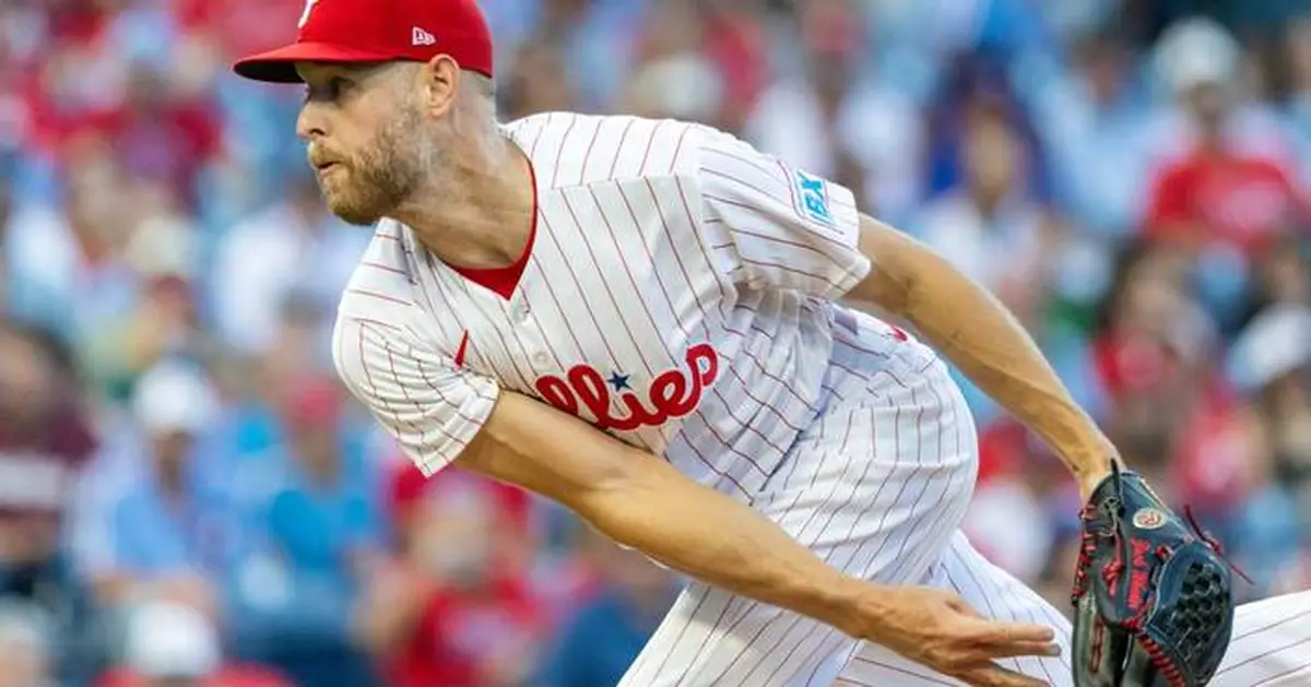 Wheeler fans 9 in 6 sharp innings, Schwarber hits 41st homer to lift Phillies past Braves 4-2