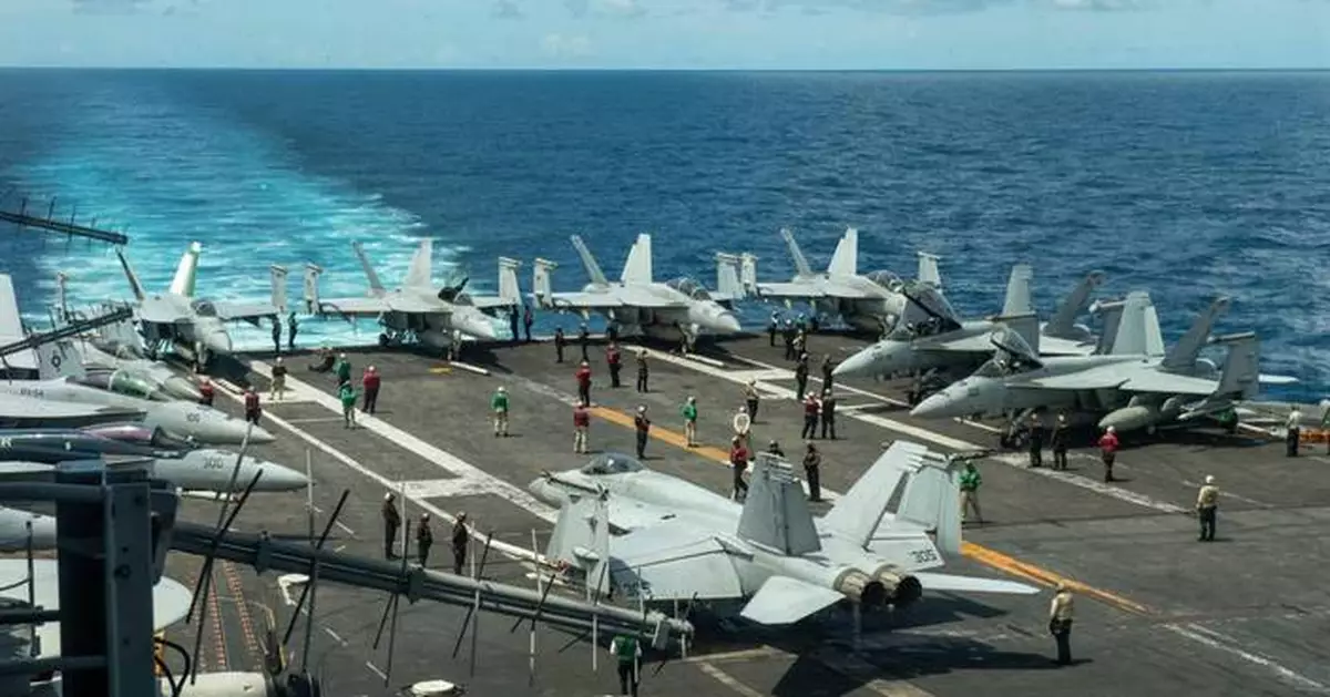 2 Navy aviators eject while landing plane on carrier off Virginia, 6 other sailors also hurt