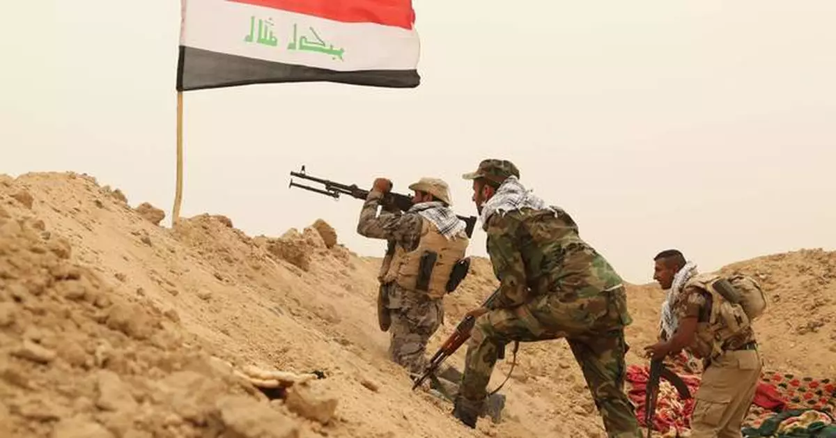As the last US troops pack up in Iraq, militias signal their weapons will stay