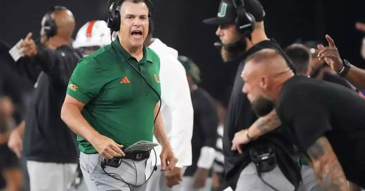 Mensah sets ACC consecutive-completions marks, defense rises in 4th as No. 5 Miami tops Wake Forest