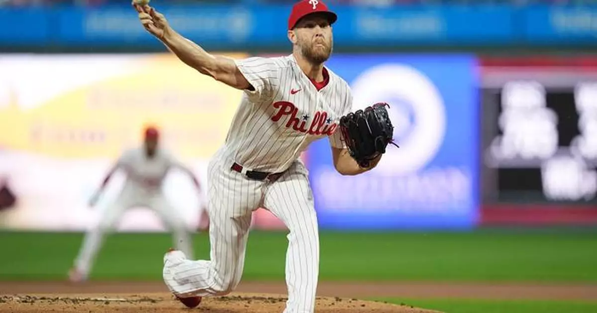 Wheeler fans 7 straight to open game, Stott hits tiebreaking RBI single as Phillies beat Brewers 6-4