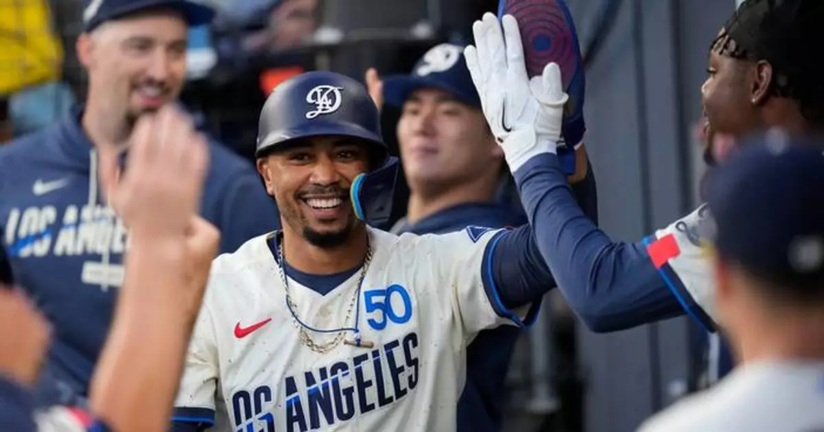 Dodgers outslug Giants 10-4, led by Mookie Betts with four hits