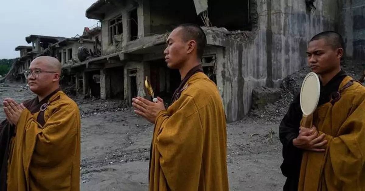 Nepal holds a day of mourning after floods kill 1,300