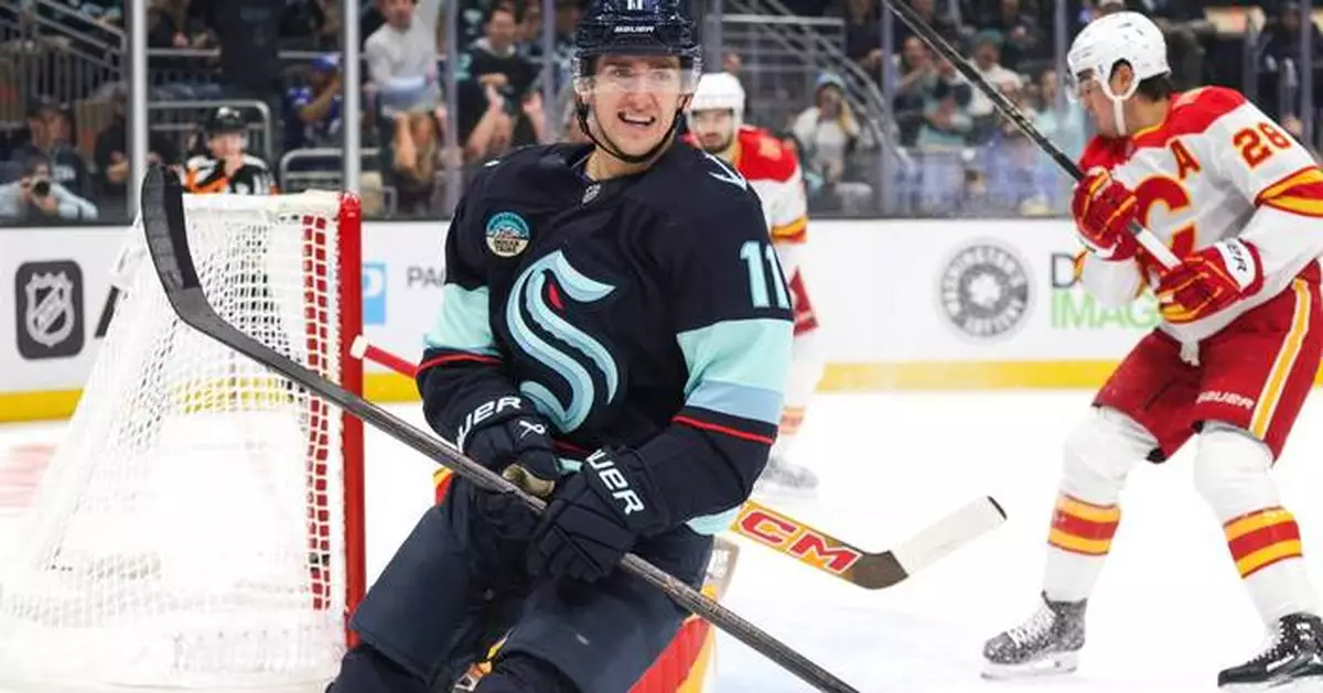 Samoskevich scores twice and Kraken beat Flames 6-1 in home opener as Calgary stays winless
