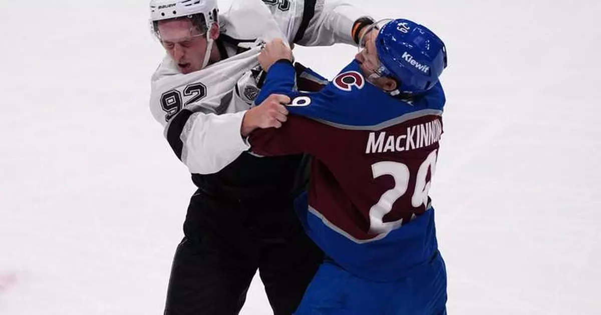 MacKinnon has 2 goals and a rare fight in the Avs' 8-4 victory over the Kings in opener