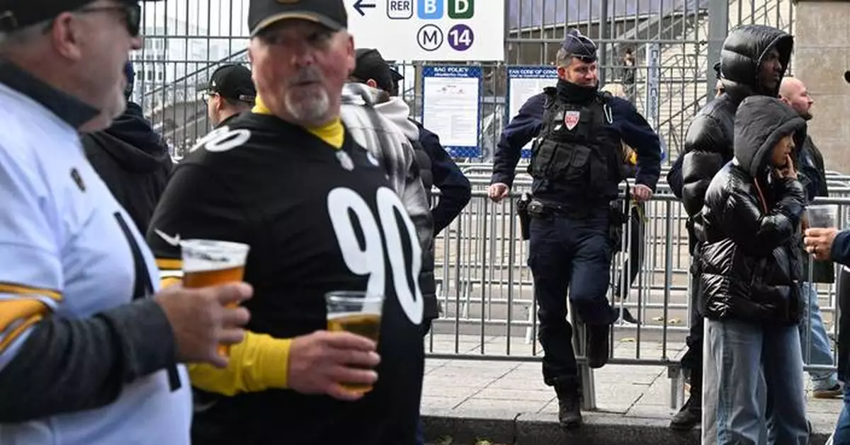 Good mood among fans attending the first NFL game in Paris, a day after protests and clashes