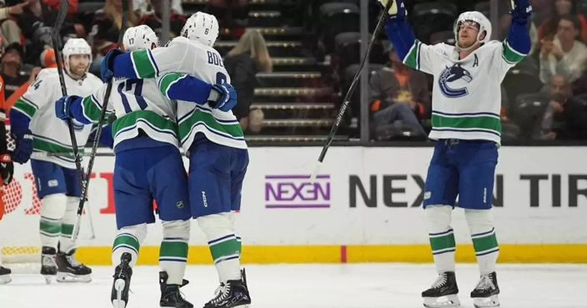 Hronek’s OT power-play goal caps the Canucks’ 6-5 comeback win over the Ducks