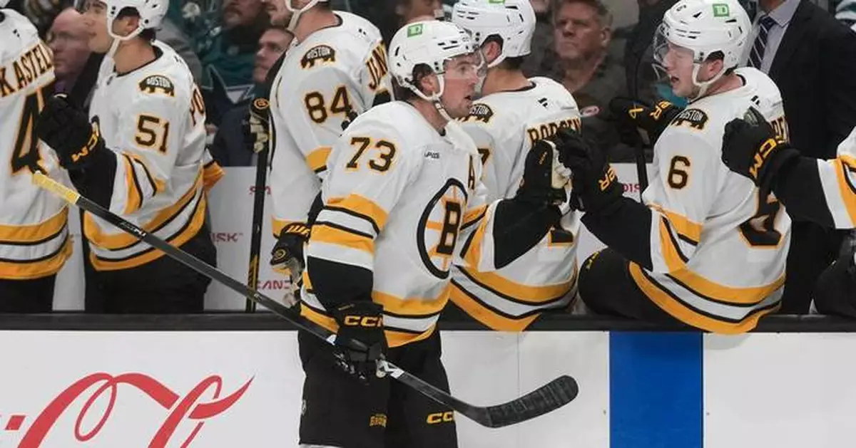 McAvoy scores in his 1st game back from a suspension to lead the Bruins past the Sharks 6-3