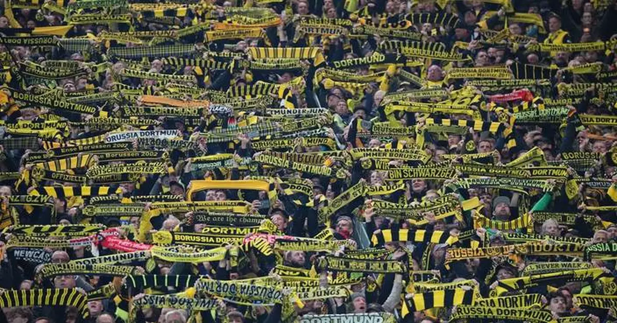 Stop the selfies! German soccer club rewards fans who avoid their phones during games