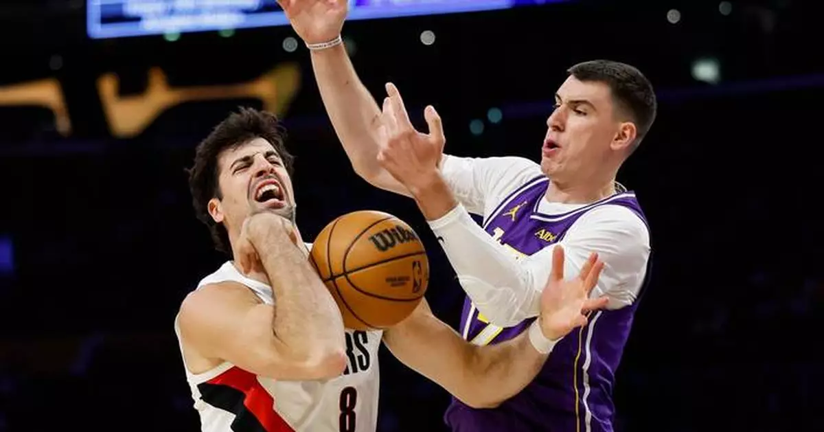 Ja Morant, Damian Lillard lead unbeaten Trail Blazers past Lakers 136-129 despite Luka Doncic's 41