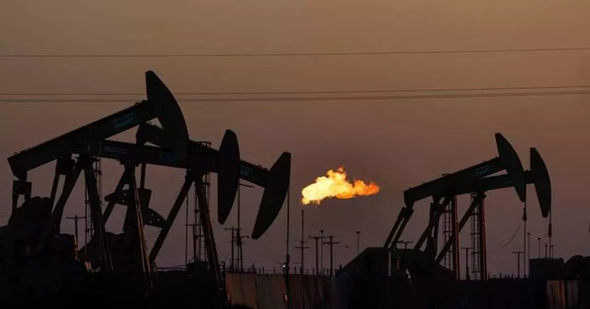 Trump says he's ending restrictions on climate-warming methane from oil drilling