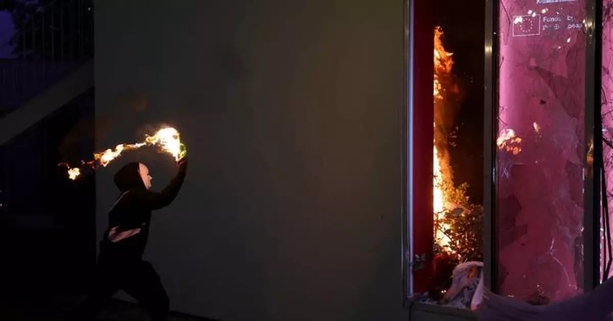 Tear gas, fires and clashes as anti-government unrest escalates in Albania, in photos