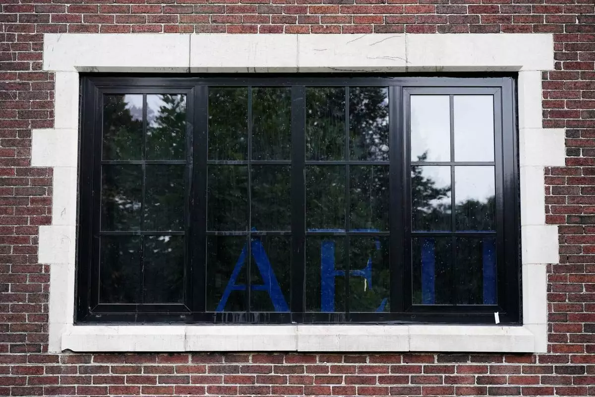 The AEPi fraternity house near the University of Chicago campus in Chicago, Wednesday, Oct. 14, 2026, where an alleged sexual assault was reported at a weekend party. (AP Photo/Nam Y. Huh)