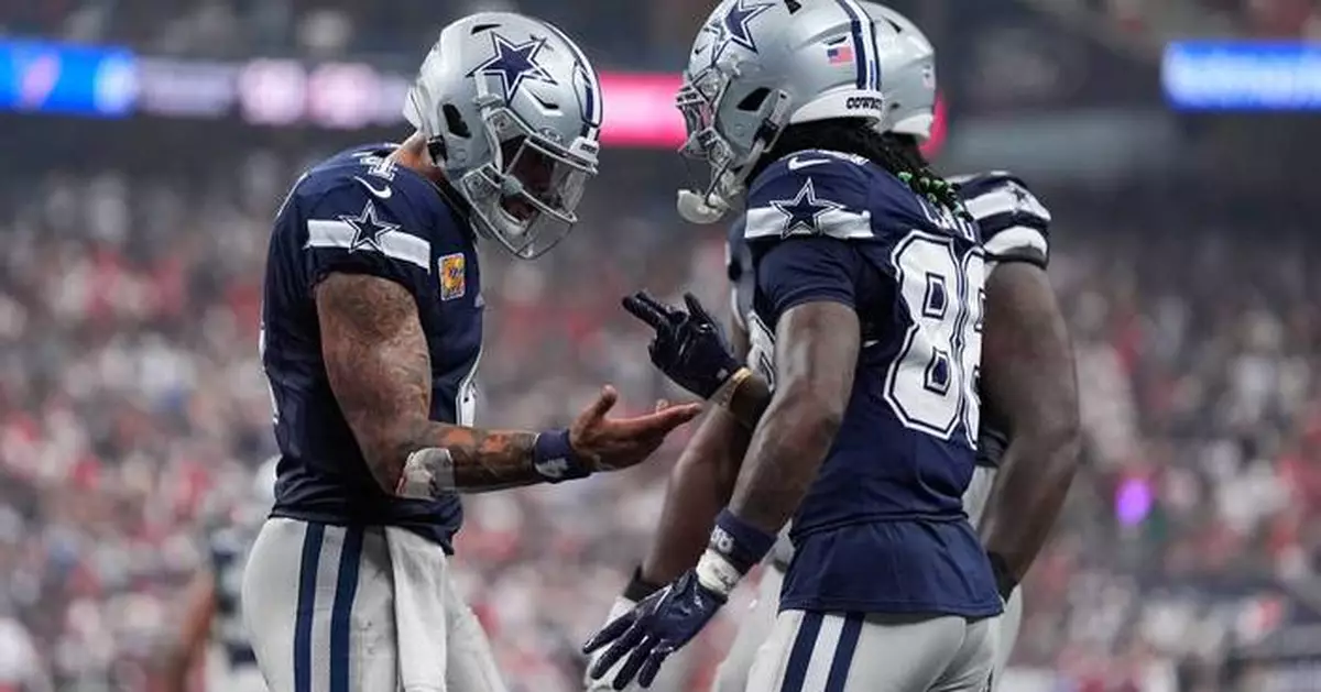 CeeDee Lamb’s late TD caps a wild Cowboys rally to beat winless Texans 34-30