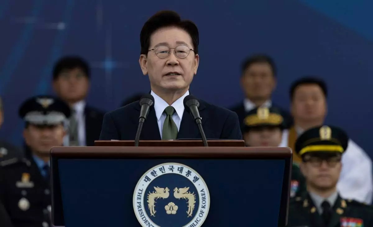 South Korean President Lee Jae Myung delivers a speech during the Armed Forces Day at a military base in Gyeyong, South Korea, Thursday, Oct. 1, 2026. (Jeon Heon-kyun/Pool Photo via AP)