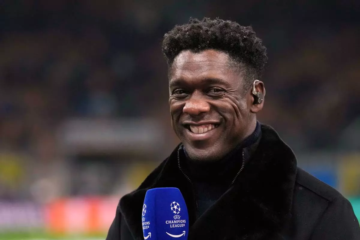 FILE - Former soccer players Clarence Seedorf smiles during an interview prior to the Champions League quarterfinal second leg soccer match between Inter Milan and Bayern Munich at the San Siro stadium in Milan, Italy, April 16, 2025. (AP Photo/Luca Bruno, File)