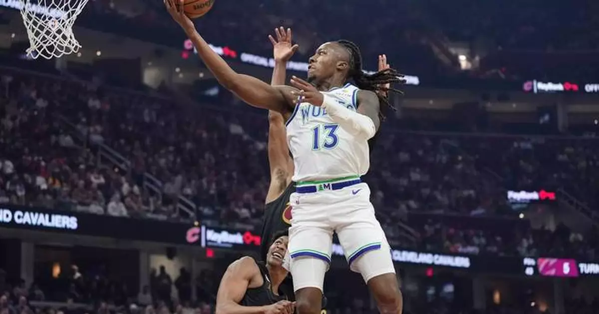 Mitchell scores 26 as Cavaliers rally and defeat Timberwolves 127-125 in overtime