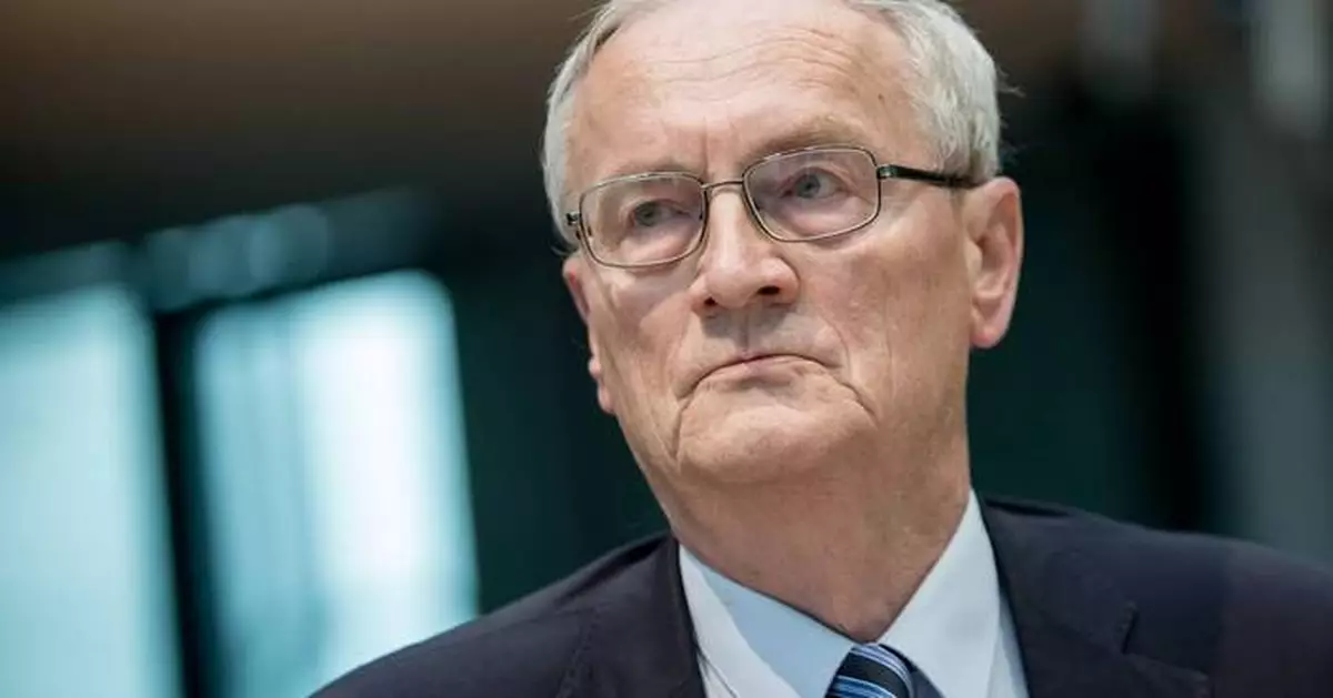 Ex-spy chief is arrested in Germany on suspicion of trading state secrets and treason