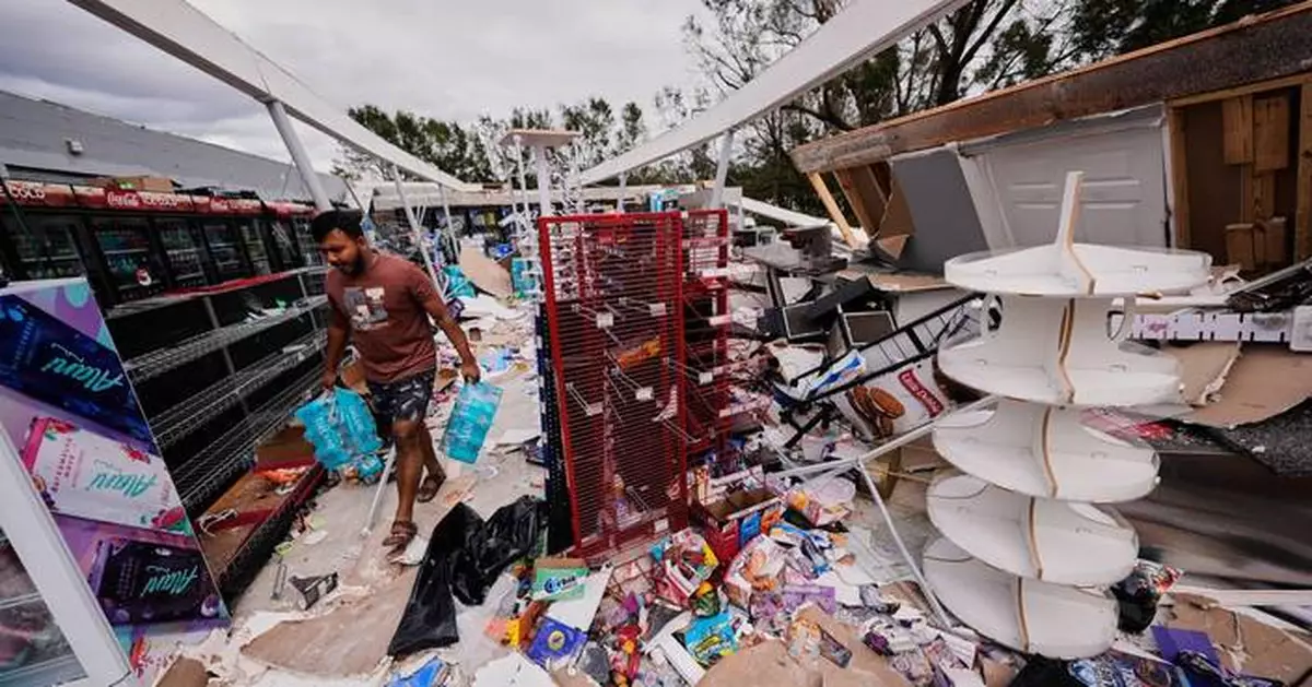 Isaias leaves trail of damage as it moves inland, in photos