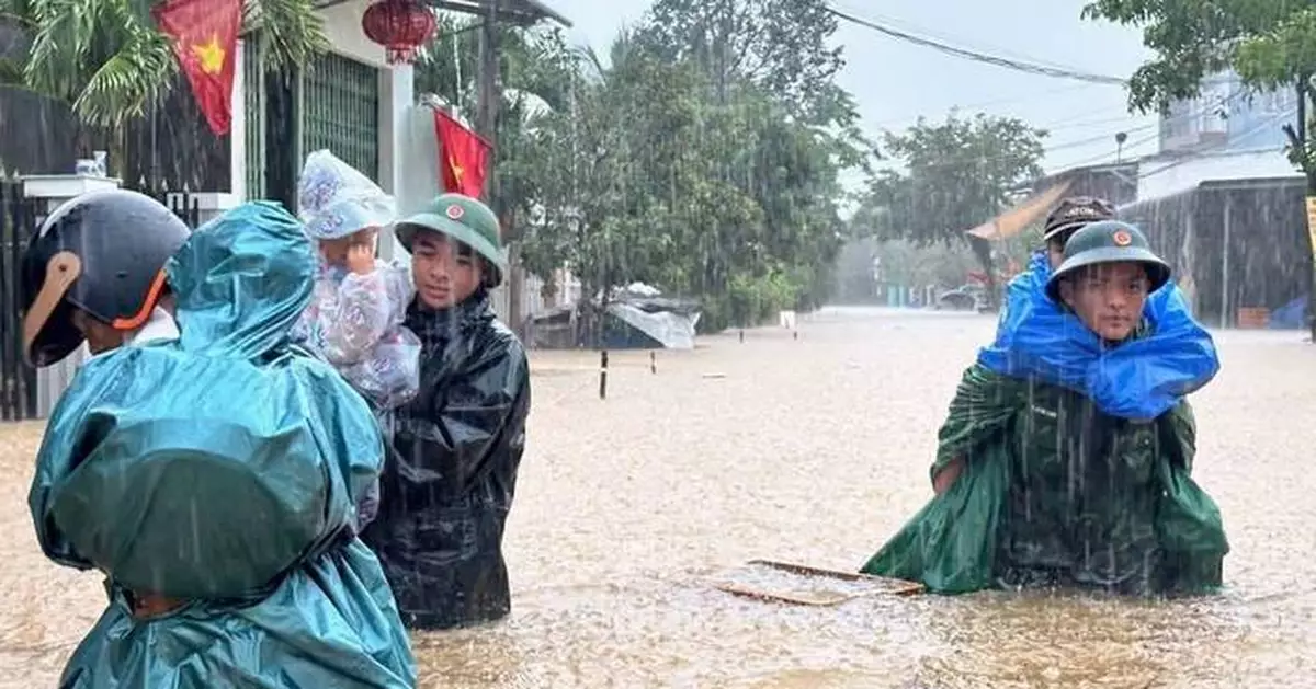 Vietnam mobilizes troops after heavy rains trigger flash floods and raise risks of landslides