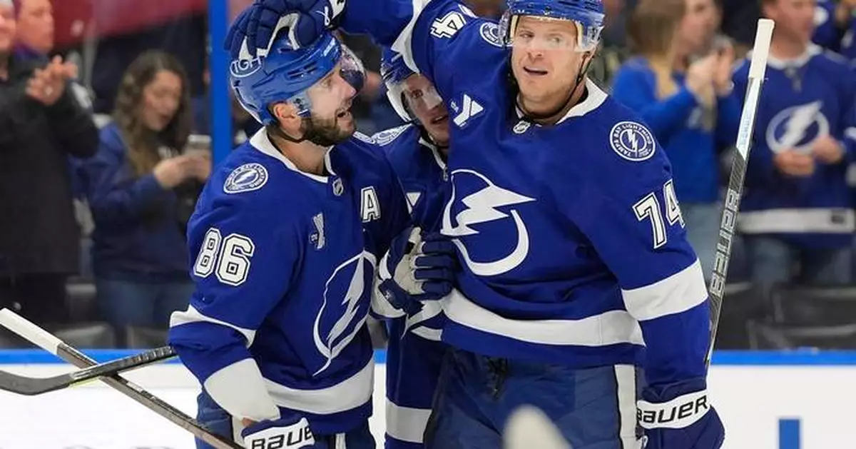 Carlson scores twice to help the Lightning beat the Wild 3-2