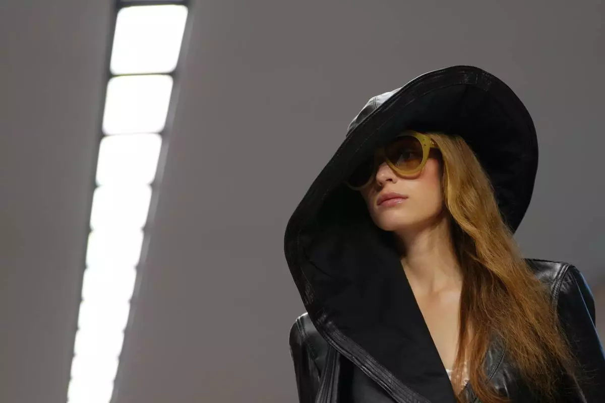 A model wears a creation as part of the Chloe Womenswear Spring Summer 2027 collection presented in Paris, France, Thursday, Oct. 1, 2026. (AP Photo/Aurelien Morissard)